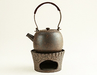 Чайник керамический дровяного обжига на подставкой с греющей свечой