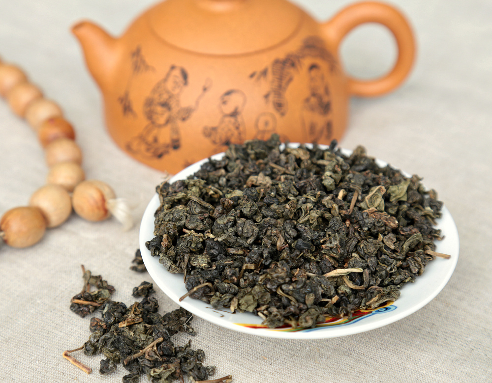 Улун чай польза для женщин. Чай - улун женьшень. Китайский чай женьшень улун. Женьшень улун чайная Лавка. Ginseng Oolong with чай.